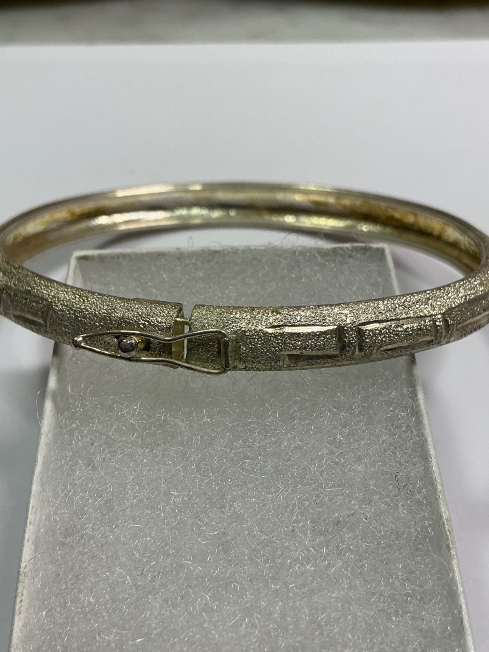 FAS Sterling Silver Bangle with closure latch. 2 3/8 inches across